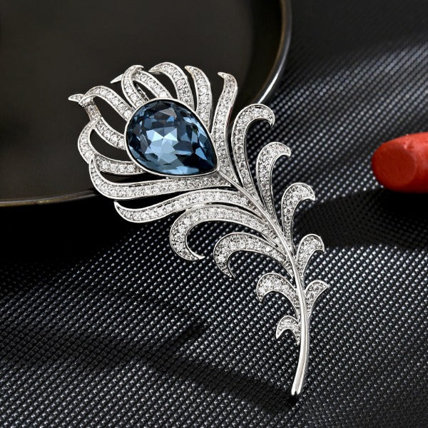 Blue crystal feather brooch