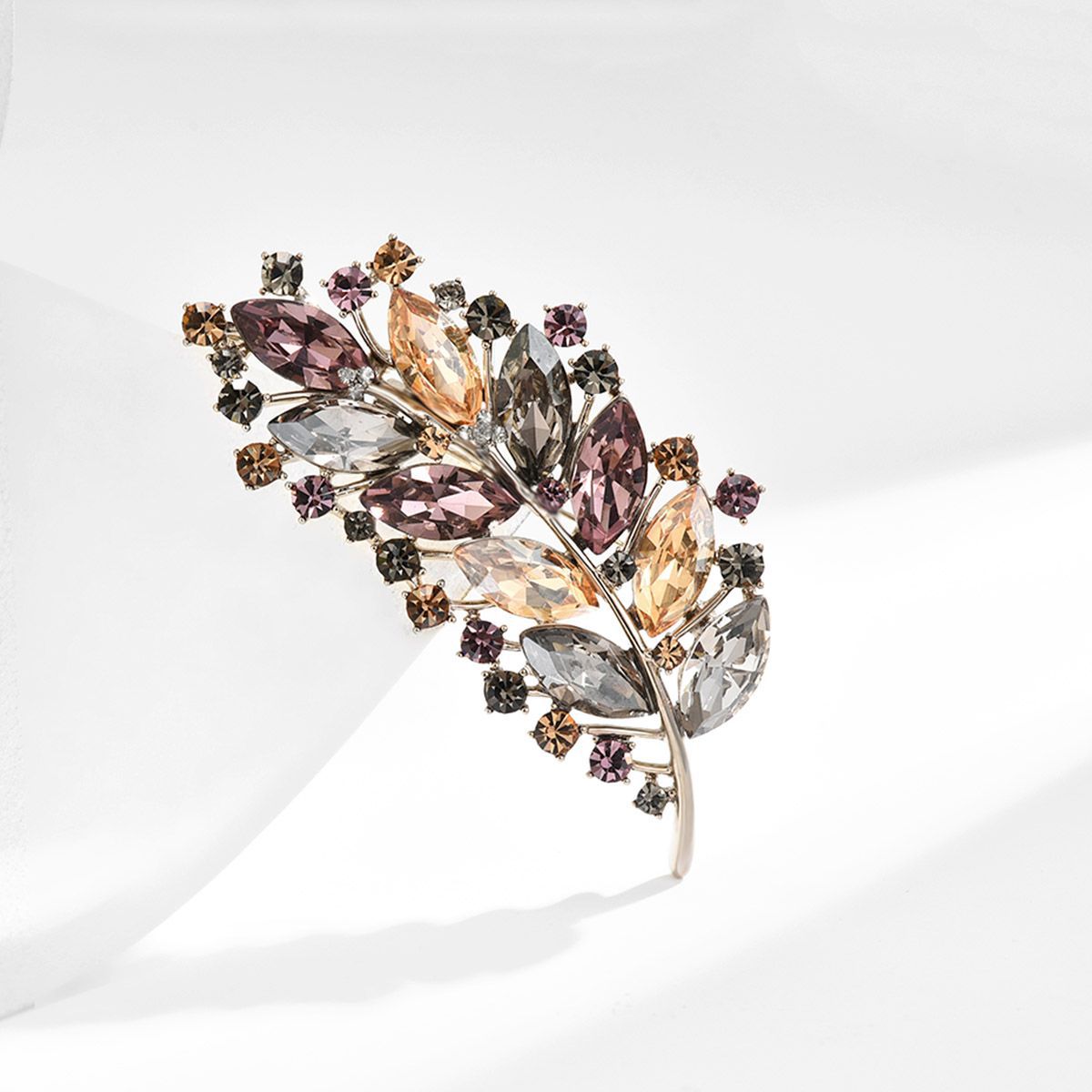 Vintage crystal feather brooch