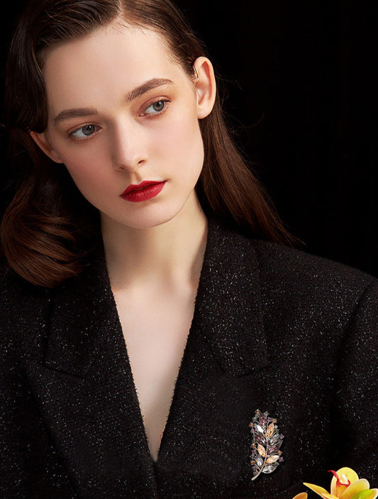 Vintage crystal feather brooch