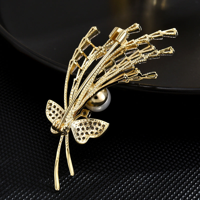 Butterfly bud brooch