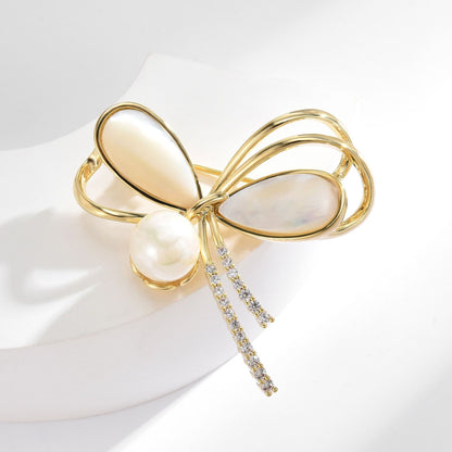 Natural shell pearl bow brooch