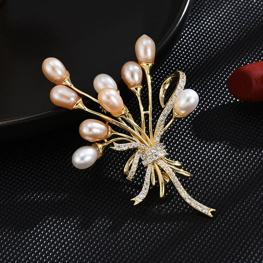 Broche ballon en perles naturelles