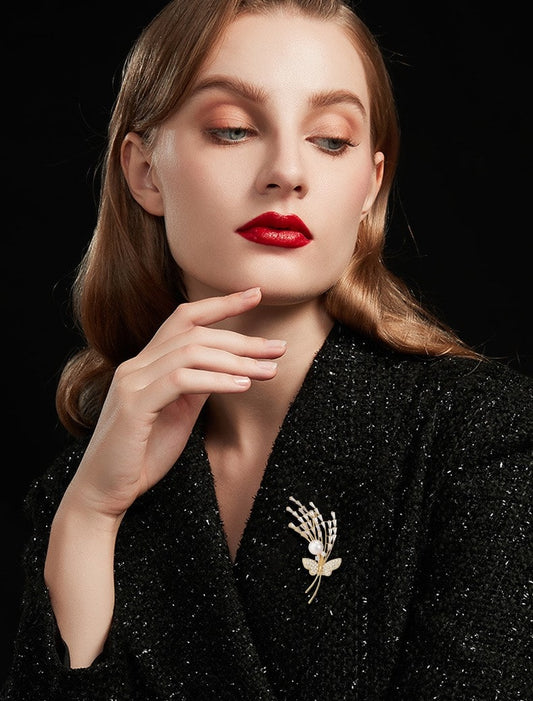 Butterfly bud brooch