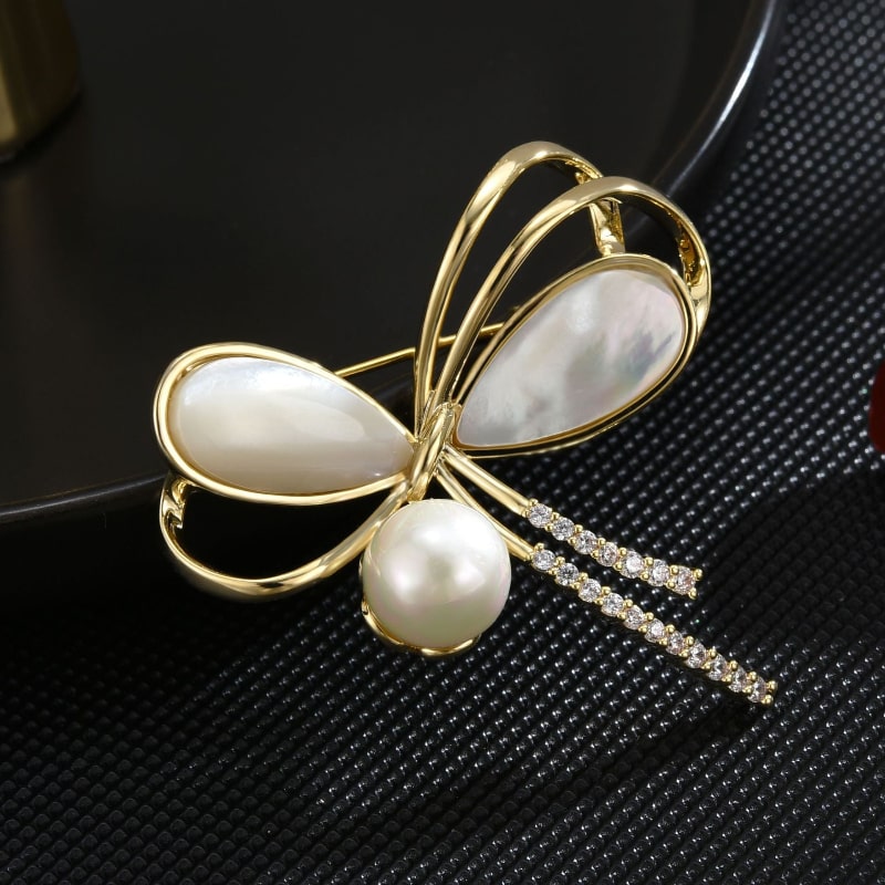 Natural shell pearl bow brooch